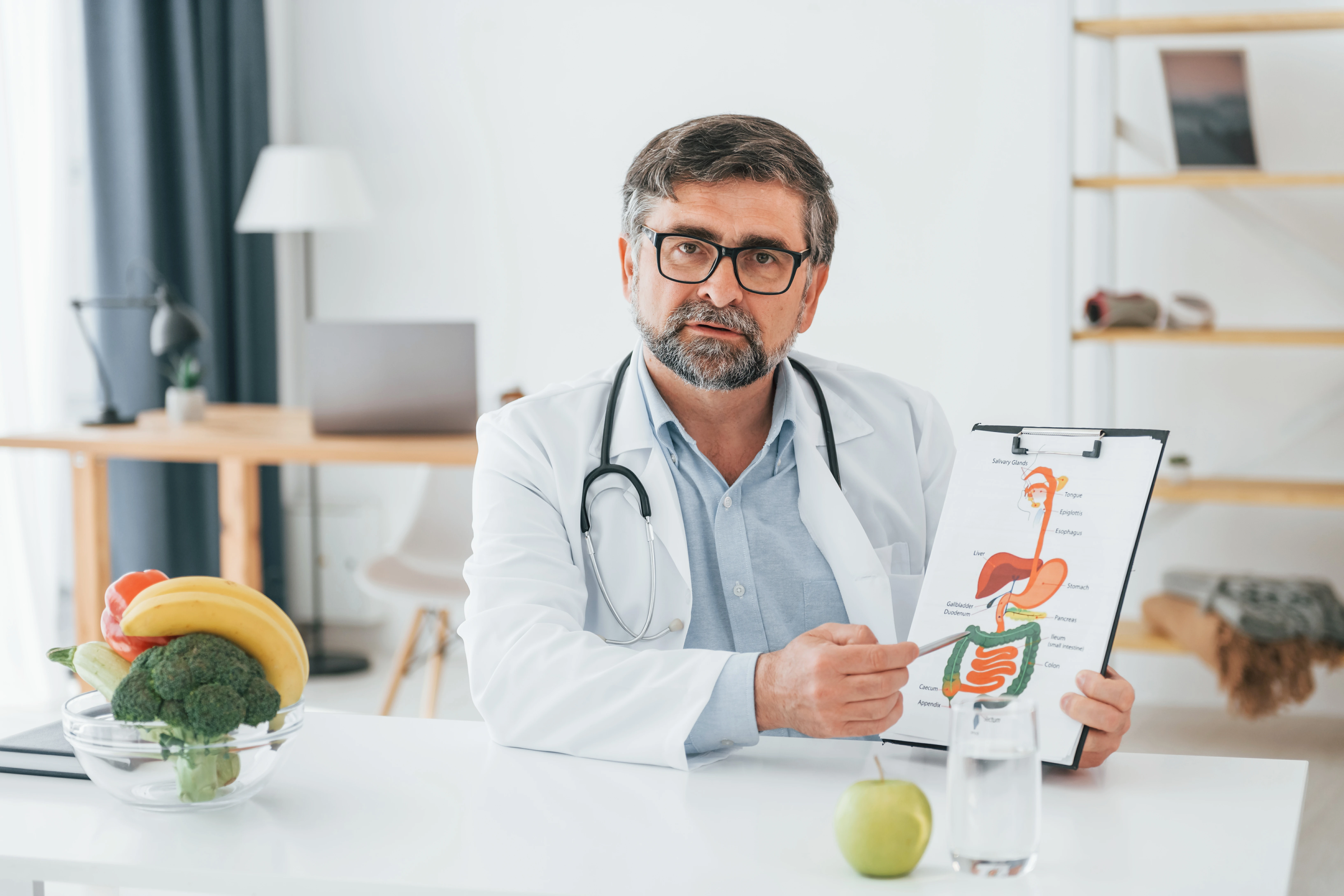 man-is-showing-illustration-conception-of-dieting-2023-11-27-05-31-42-utc